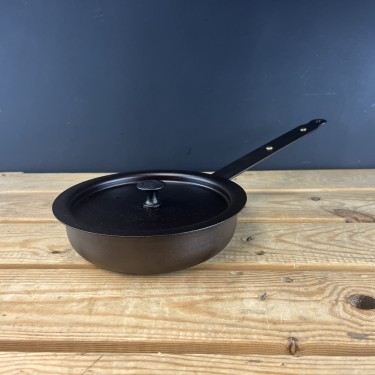 Re-seasoning service: Any frying pan and lid or wok and lid and Prospector Casseroles with metal handles and knobs.