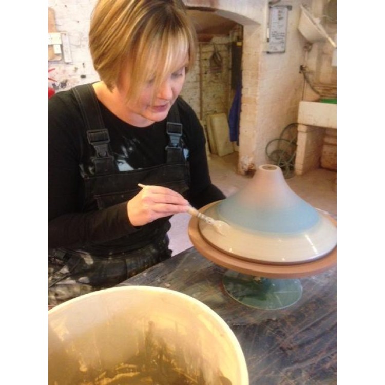 Rachel throwing & painting tagines Rachel throwing & painting tagines