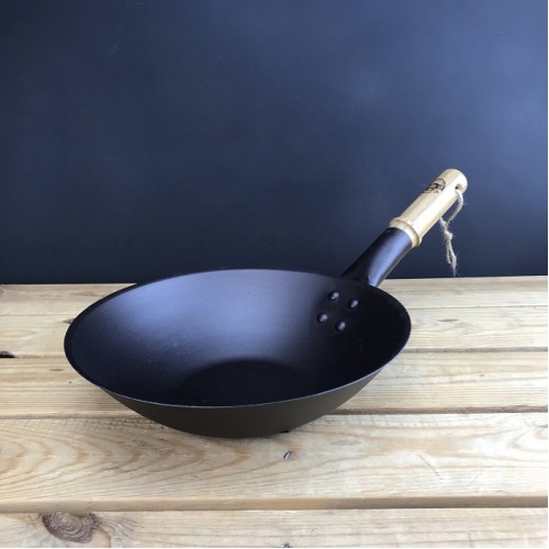 https://www.netherton-foundry.co.uk/image/cache/catalog/woks/11%20inch%20wok%203.4%20with%20rivets%20sml-500x500.jpg