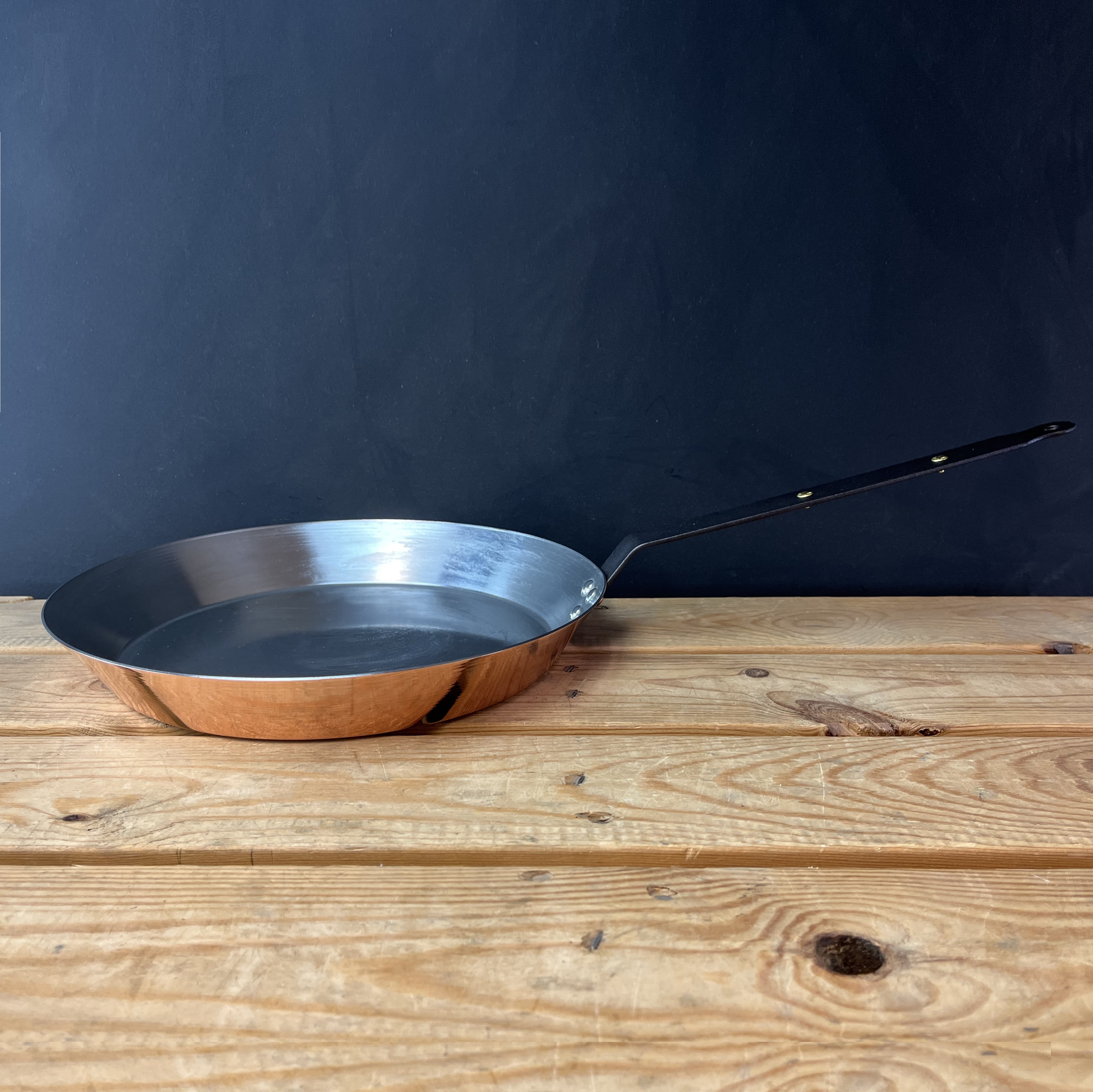 A commissioned long handled frying pan finished today. A shallow